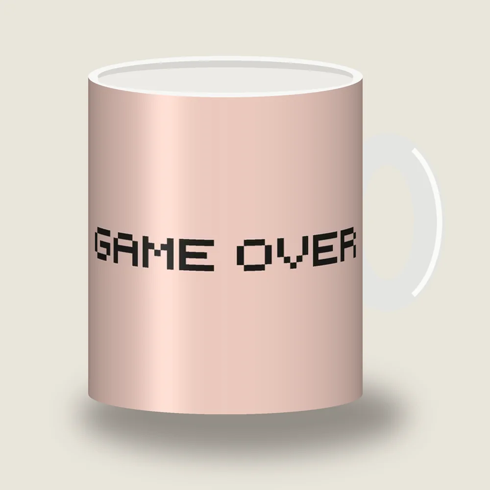 Game Over in pixel lettering on a mug