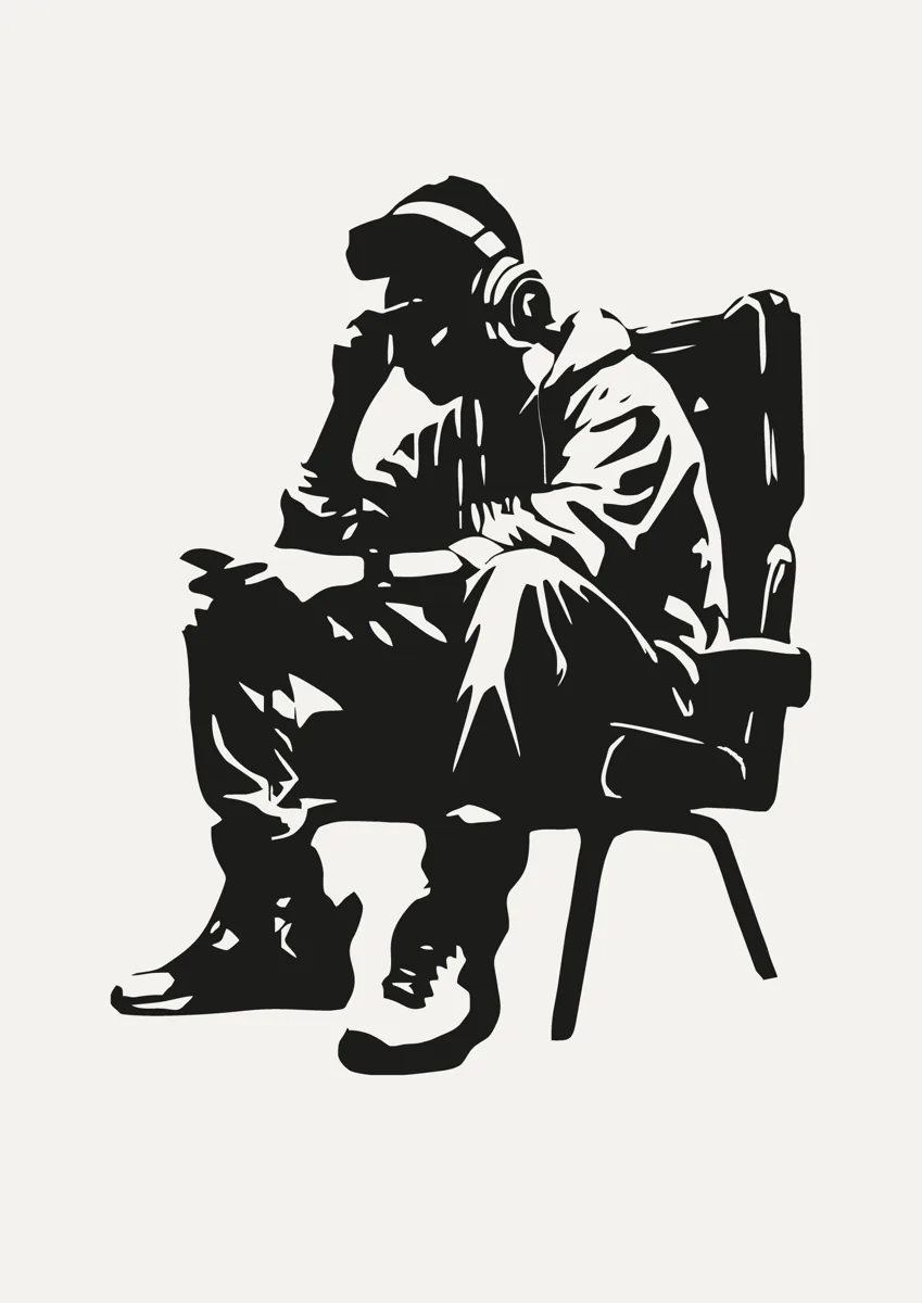 Gamer sitting in a chair with hood up holding a controller