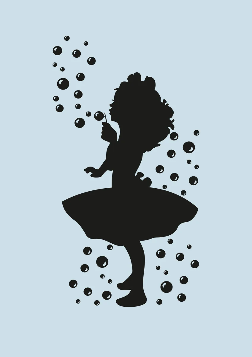 Silhouette of a little girl in a full dress surrounded by bubbles