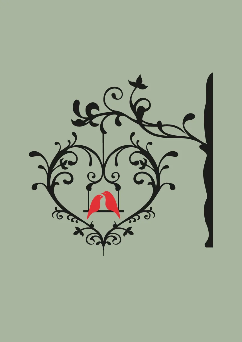 Two red love birds on a swing inside a decorative heart