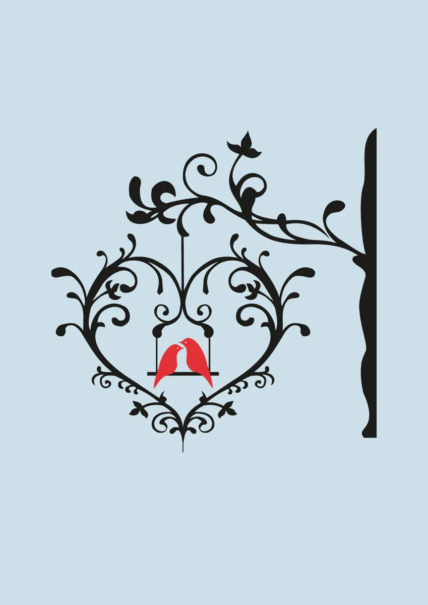 Two red love birds on a swing inside a decorative heart