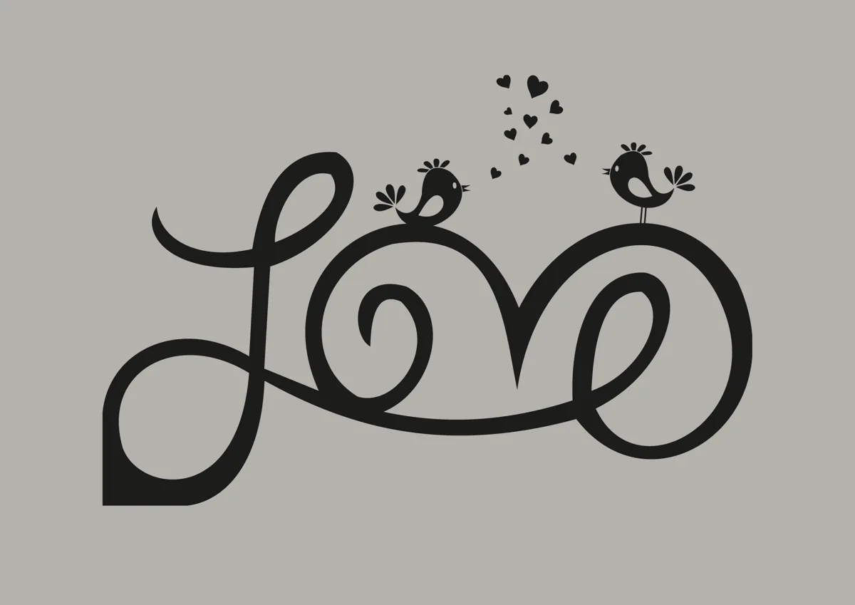 Two birds perched on the word love in script with hearts