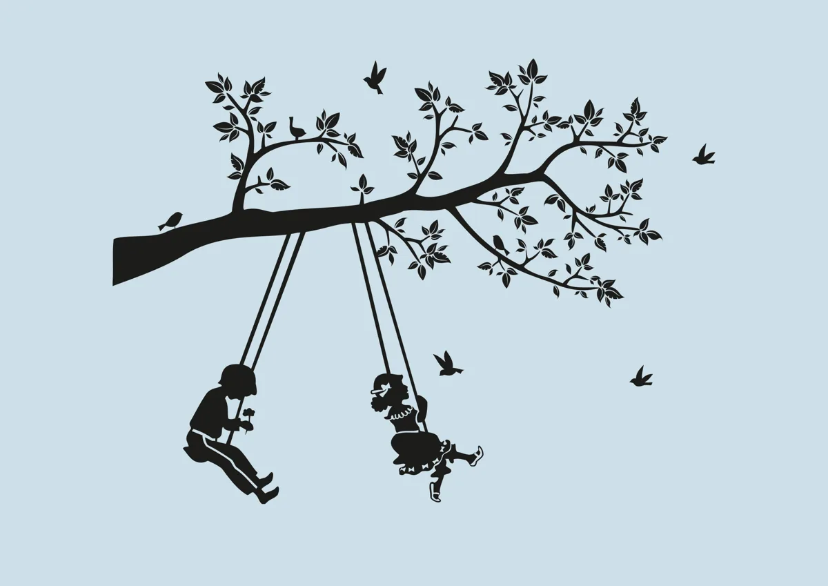 Child on a rope swing hanging from a leafy branch